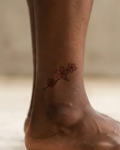 Cherry blossoms tattoo on a ankle, preview