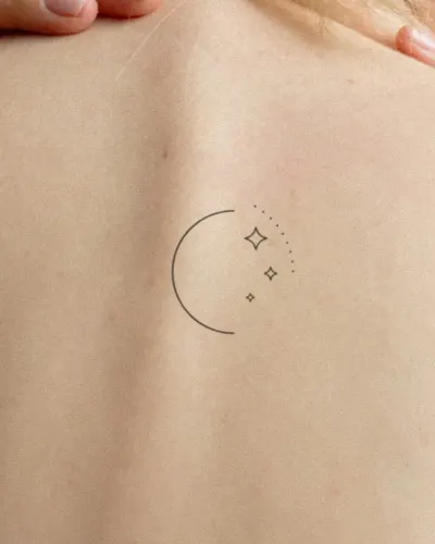 Crescent moon & stars tattoo on a back, preview