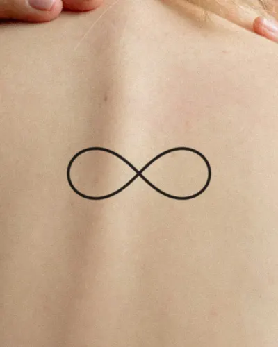 Infinity tattoo on a back, preview