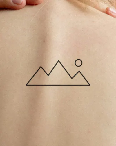 Mountain range tattoo on a back, preview