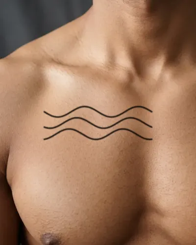 Ocean waves tattoo on a chest, preview