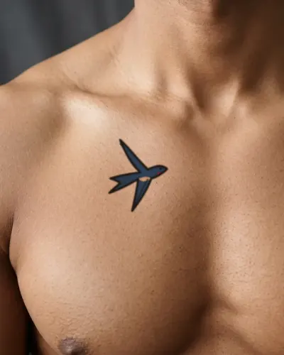 Traditional swallow tattoo on a chest, preview