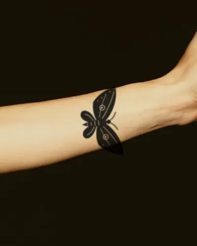 Moth tattoo on a forearm, preview