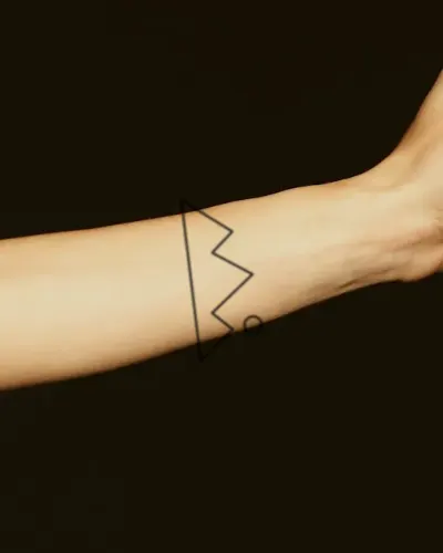 Mountain range tattoo on a forearm, preview