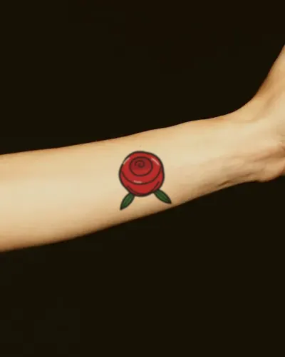 Traditional rose tattoo on a forearm, preview