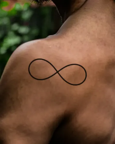 Infinity tattoo on a shoulder, preview