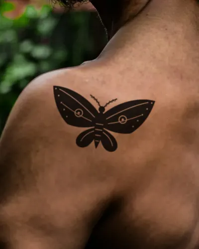 Moth tattoo on a shoulder, preview