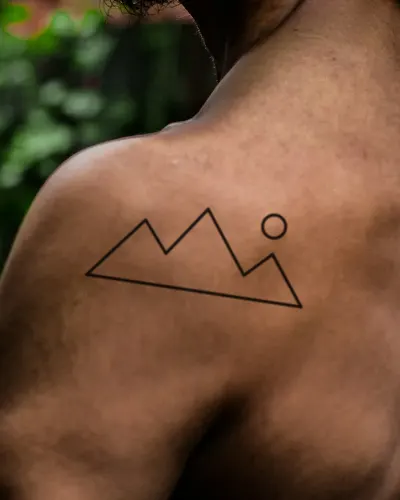 Mountain range tattoo on a shoulder, preview