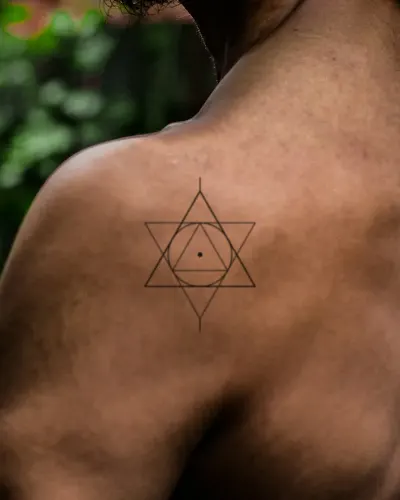 Sacred triangles tattoo on a shoulder, preview