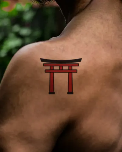 Torii gate tattoo on a shoulder, preview