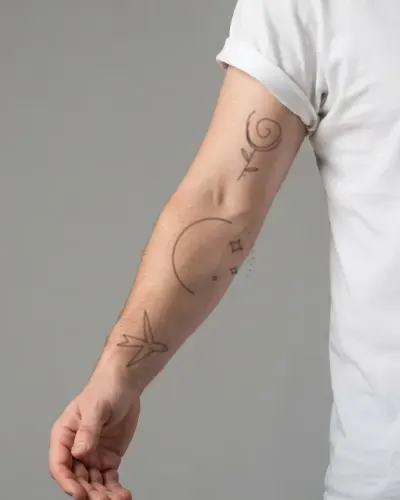 Crescent moon & stars tattoo on a sleeve, preview