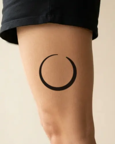 Ensō tattoo on a thigh, preview