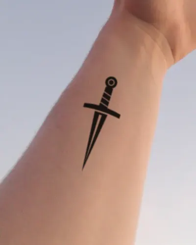 Dagger tattoo on a wrist, preview